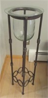 Vase on stand. Measures: 36" Tall.