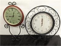 WROUGHT IRON TRIMMED CLOCKS