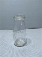 Small glass pure Holstein milk bottle