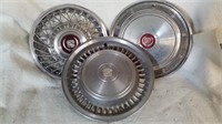 3 vintage Cadillac  hub caps