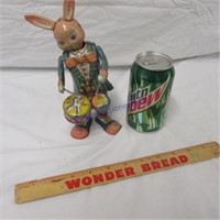 Vintage windup rabbit playing drums