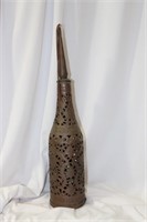 A Reticulated Metal Candle Holder