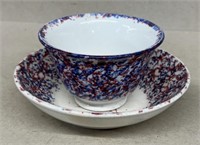 Spatterware cup and saucer