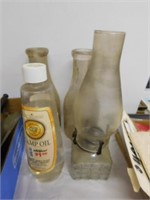 Two one quart dairy bottles (as dug up) - lamp &