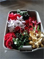 Tote of artificial Christmas flowers