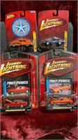 4 Johnny Lightning Die Cast cars