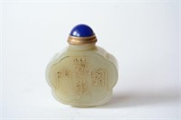 Small carved jade snuff bottle with engraved bird