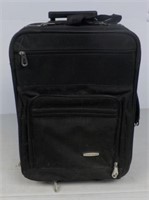 Protégé carry on bag with handle and rollers.