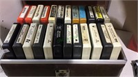 8 track case filled with 24 8 tracks, includes