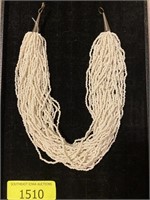 white bead necklace