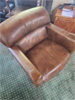 Rolling office chair- brown leather has wear