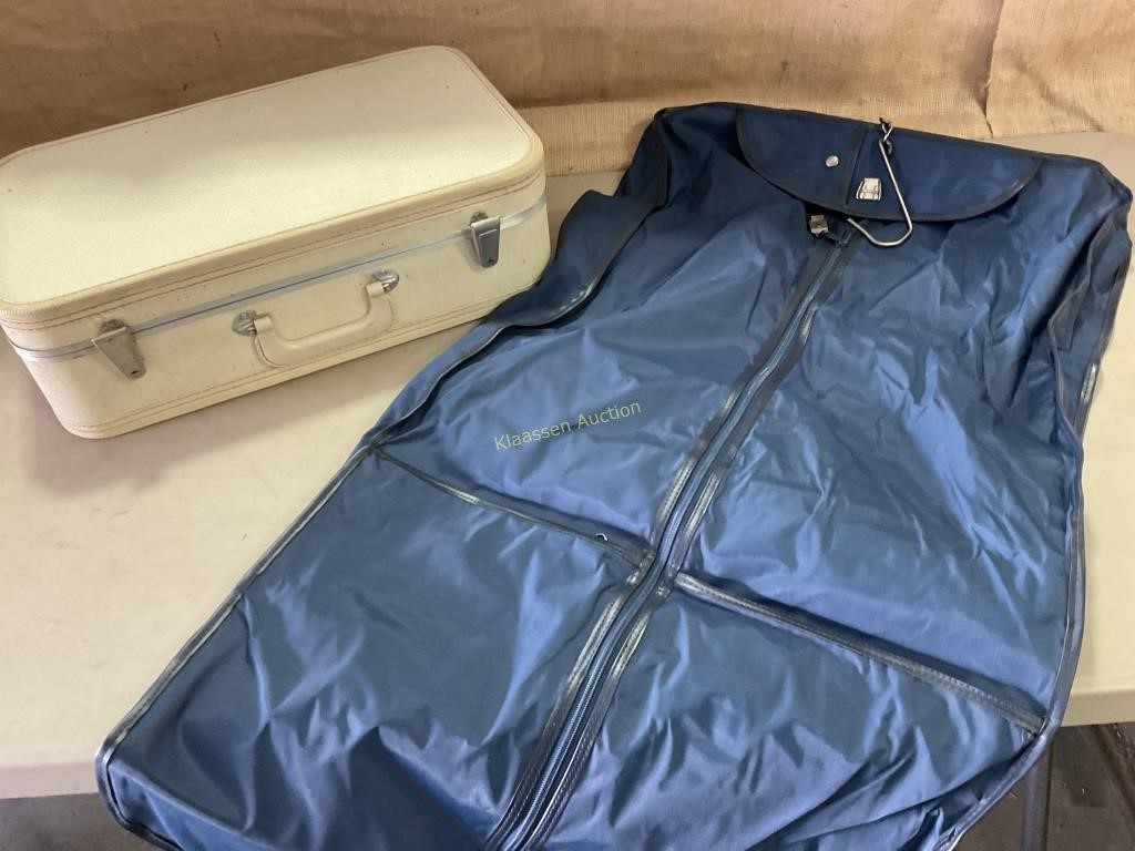 New hanging garment bag and classic suitcase