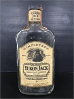 Vintage Yukon Jack glass whisky bottle w/ stamp