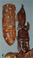 2 carved tribal masks 24" one w/ fish