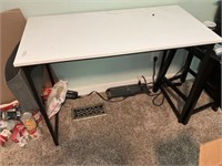 Desk with hanging storage on side
