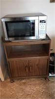 GE stainless steel microwave and microwave cart