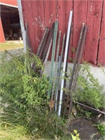 Fence Posts and Metal Pile