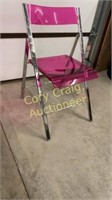 Pink folding acrylic chair