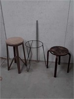 One bar stool that is metal yard art metal stand