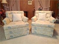 2 vintage sofas with a floral pattern theme, and