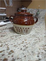 Boston baked beans crock. Lid has been repaired.