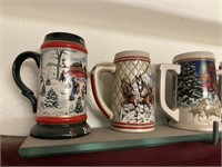 LARGE LOT OF BEER STEINS ON TOP OF SHELF