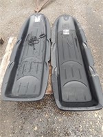 2 Black plastic sleds