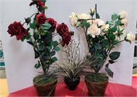Artificial roses in plastic pots