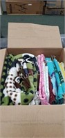 Box of assorted flannel and quilting material,