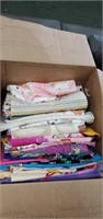 Box of assorted quilting material, box size is 12