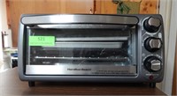 Hamilton Beach toaster oven with book and