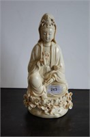 Dehua figure of Guanyin holding a pearl and