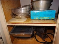 Baking pans, contents of cabinet (some show wear)