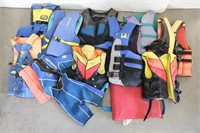 (9) Life Jackets, Rip Curl Wet Suit, Seat Device