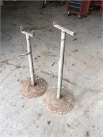 Adjustable material stands