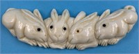 Vintage Asian bone carving of 4 hares with black g