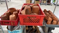 Shelf of clay pots