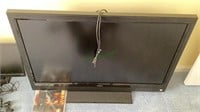Vizio brand 42 inch flat screen TV with owners