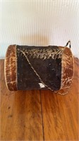 Cowhide covered drum, with a twisted cowhide