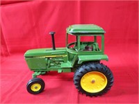 Ertl john Deere tractor farm toy.