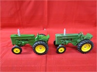 (2)Ertl john Deere tractor farm toy.