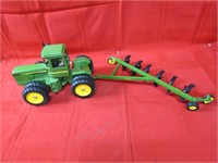 Ertl john Deere tractor & plow farm toy.