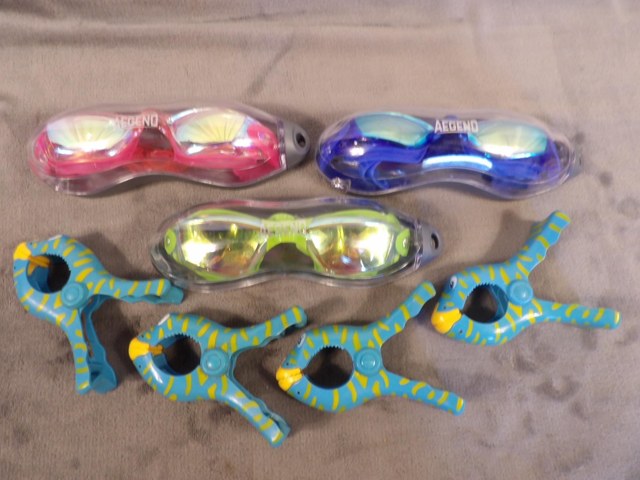 Lot of Swim Goggles and Towel Clips