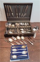 Vintage flatware in silverware chest