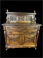 LARGE OAK BUFFET WITH CARVED BACK