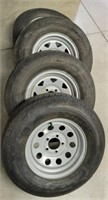 (4) ST 215-75R14 Trailer Tires W/ Wheels