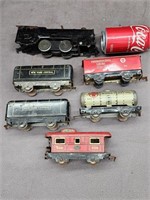 Vintage toy train.  Played with condition.   Look