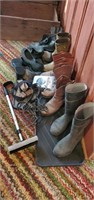 Assorted boots, galoshes, ice tracks and squeegee