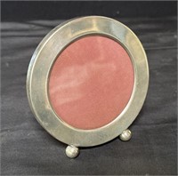 Round sterling tabletop picture frame
