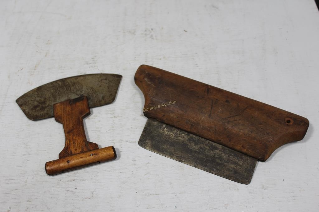 Two primitive choppers with wood handles